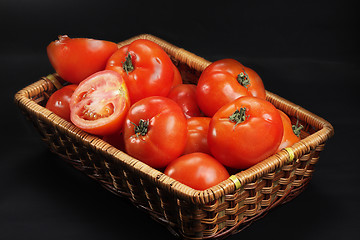 Image showing Basket with ripe red tomatoes