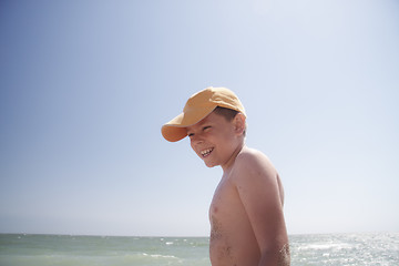 Image showing Smiling boy at sea