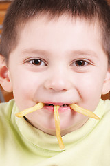 Image showing Three potatoes in mouth