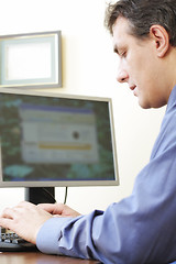 Image showing Businessman typing