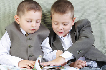 Image showing Brothers with book