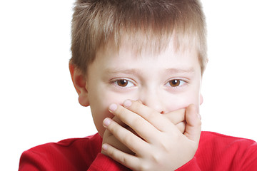 Image showing Boy in red shutting mouth