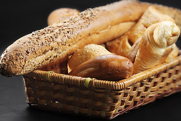 Image showing Wicker basket full of pastry