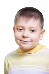 Image showing Smiling boy in yellow striped sweater