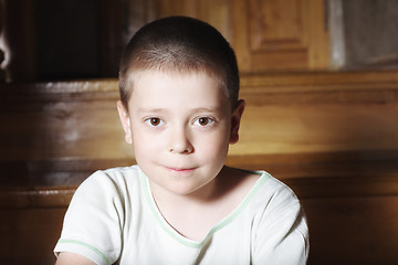 Image showing Cute boy on steps