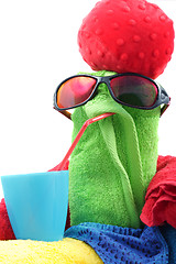 Image showing Towel person in red hat with drink