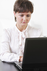 Image showing Concentrated businesswoman working on laptop