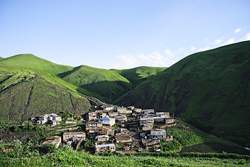 Image showing Small village hiding in mountains