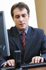 Image showing Businessman typing on keyboard