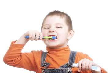 Image showing Boy with toothpaste and brush