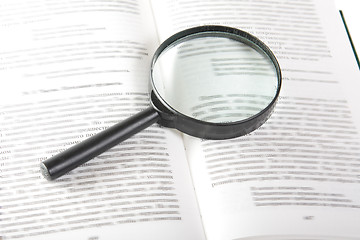 Image showing Magnifier on open book