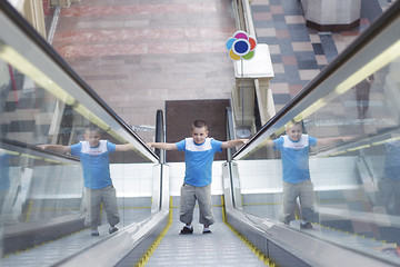 Image showing Boy on escalator