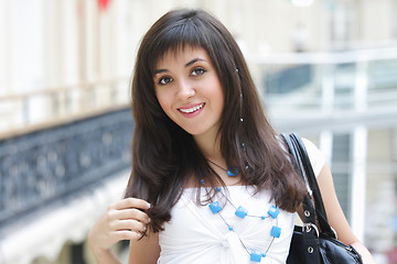 Image showing Brunette woman in shopping centre