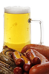 Image showing Sausages and mug of beer