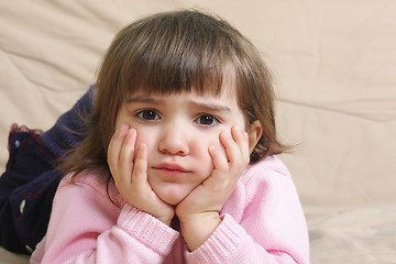 Image showing Sad girl on sofa