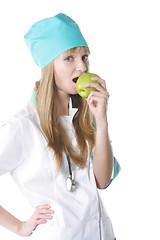 Image showing Doctor biting apple