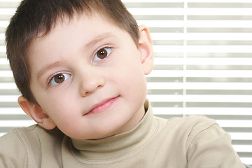 Image showing Cute boy against stripes