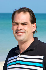 Image showing casual dark haired man at beach