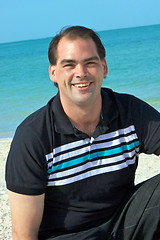 Image showing friendly smiling man at beach