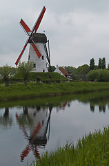 Image showing Windmill along Canal