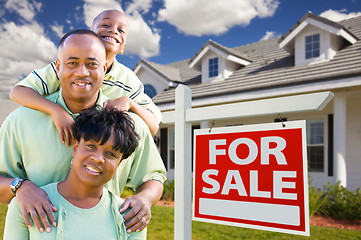 Image showing African American Family with For Sale Sign and House