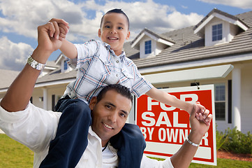 Image showing Hispanic Father and Son with For Sale By Owner Sign