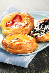 Image showing Three fruit danishes