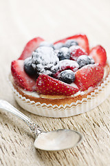 Image showing Fruit tart with spoon