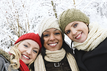 Image showing Group of girl friends outside in winter