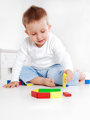 Image showing Lovely boy playing with blocks