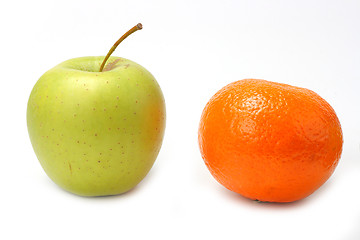 Image showing Red mandarin and green apple