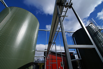 Image showing Industrial zone, Steel pipe-lines on blue sky