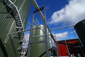 Image showing  Industrial zone, Steel pipe-lines on blue sky