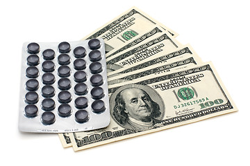 Image showing Pills and money