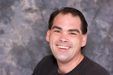 Image showing average man laughing