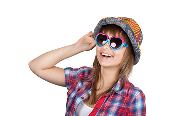 Image showing Beautiful girl smiles in sunglasseses and colour hat