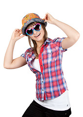 Image showing Beautiful girl smiles in sunglasseses and colour hat