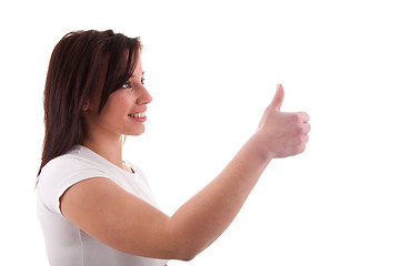 Image showing Young pretty women with thumb up
