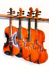 Image showing Four violins