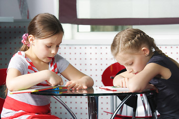 Image showing Girls reading books