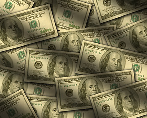 Image showing One hundred dollar bills lying flat