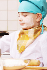Image showing Little cook at work