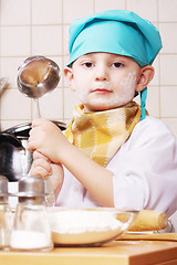 Image showing Little cook with ladle