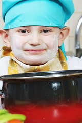 Image showing Little cook with pan