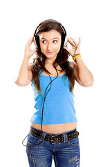 Image showing Young girl listen music