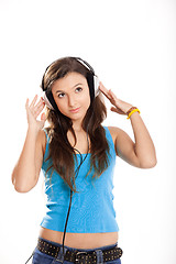 Image showing Young girl listen music