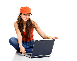 Image showing Teenager working with a laptop