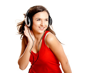 Image showing Young girl listen music