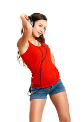 Image showing Young girl listen music