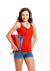 Image showing Young girl listen music